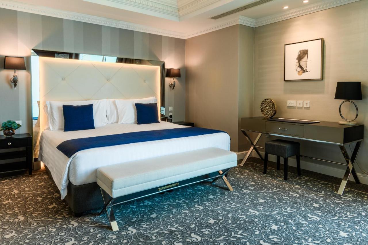 Centara West Bay Hotel&Residences Doha Exterior foto A bedroom at the hotel