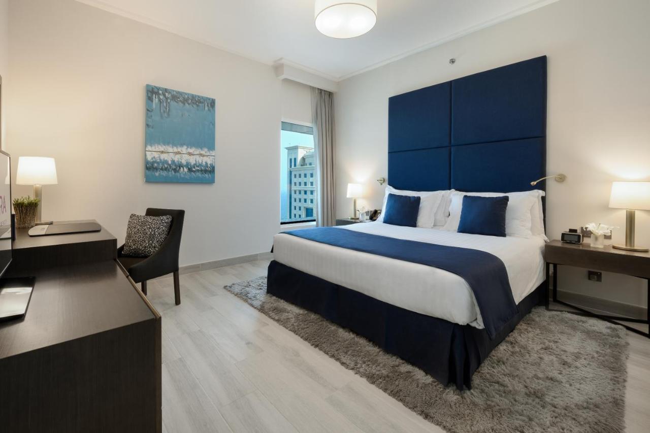 Centara West Bay Hotel&Residences Doha Exterior foto A bedroom at the hotel