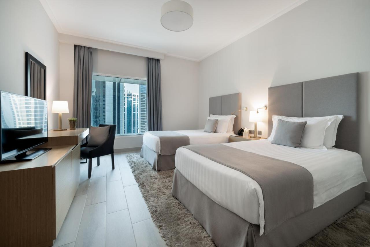 Centara West Bay Hotel&Residences Doha Exterior foto A typical guest room at the hotel