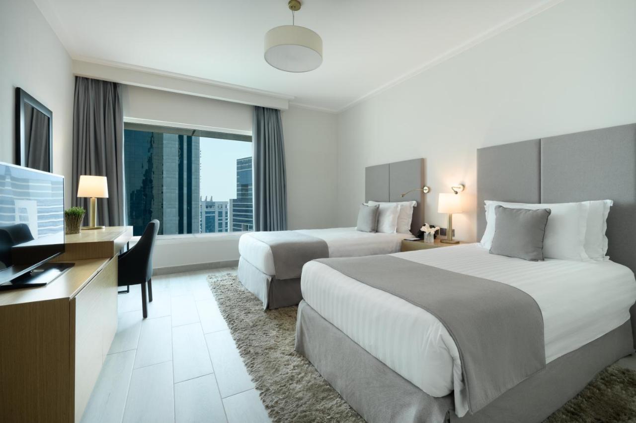 Centara West Bay Hotel&Residences Doha Exterior foto A guest room at the hotel